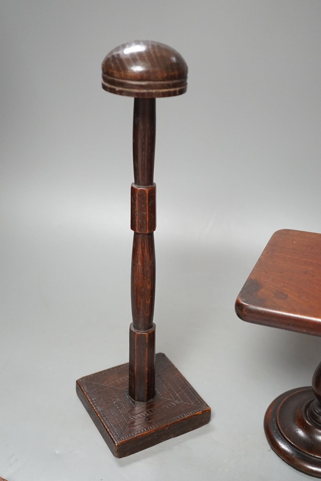 19th century Treen: mahogany candlestand, an oak hat or wig stand, 35.5cm and a burr oak hand mirror